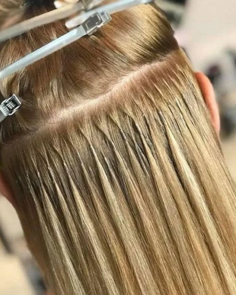 Extensiones de queratina colocadas en NOSS Estilistas
